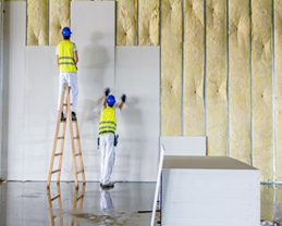 Why in some buildings glass wool is used in walls?